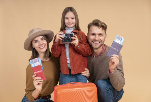 family with daughter holding passports luggage ready travel