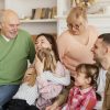 medium shot happy family couch